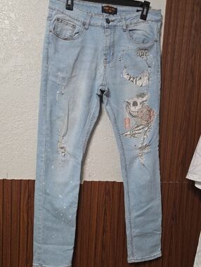 Ring of Fire Light Blue Distressed Jeans with Skull & Rose Graphic 32x30[1085]